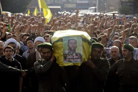 زفّ حزب الله شهداءه بفخر على جاري عادته (أ ف ب)