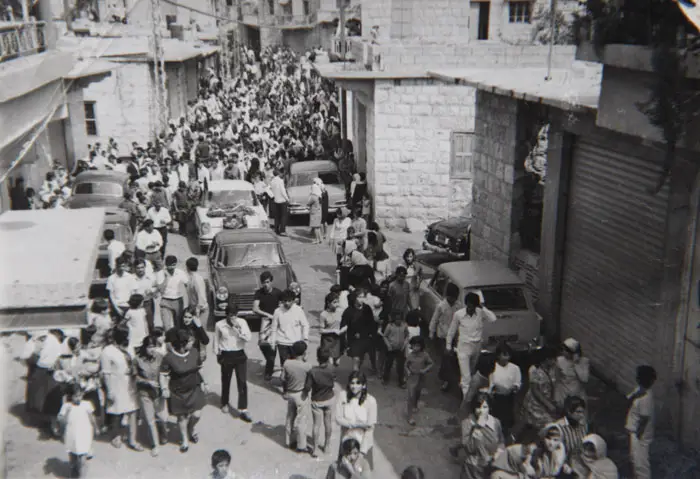 مسيرة في الخيام إحتفالاً بعيد الأستقلال، أواخر ستينات القرن الماضي - أرشيف غالب عيّاش