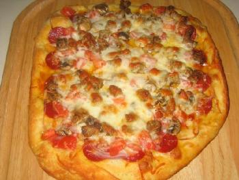 تحضير البيتزا في المنزل يستلزم حرارة فرن عالية