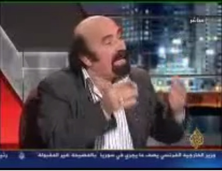 محي الدين اللاذقاني على قناة الجزيرة في برنامج الاتجاه المعاكس