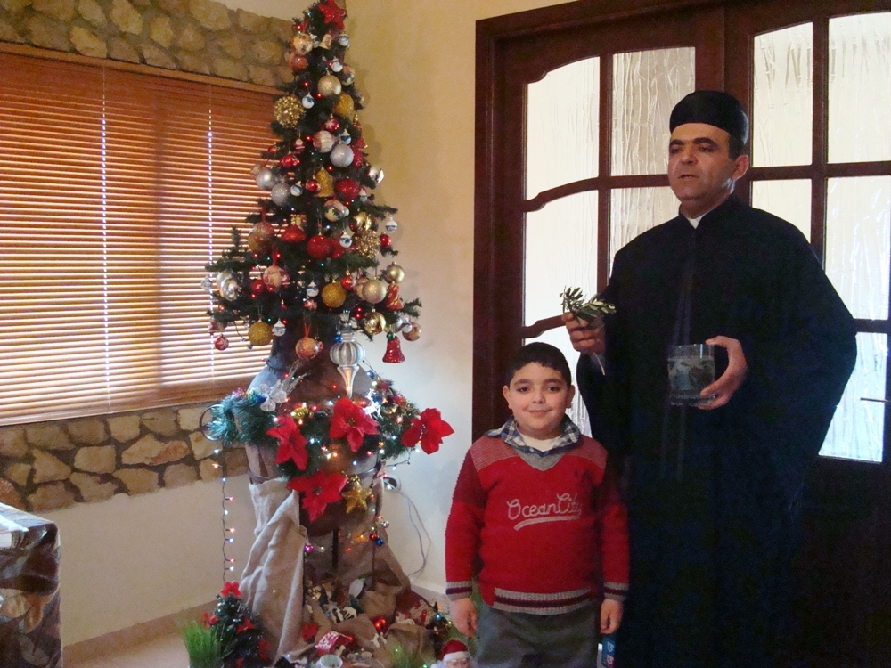 قداديس وتبريك المياه في عيد الغْطاسْ وتقاليد صنع الزلابيا في مرجعيون