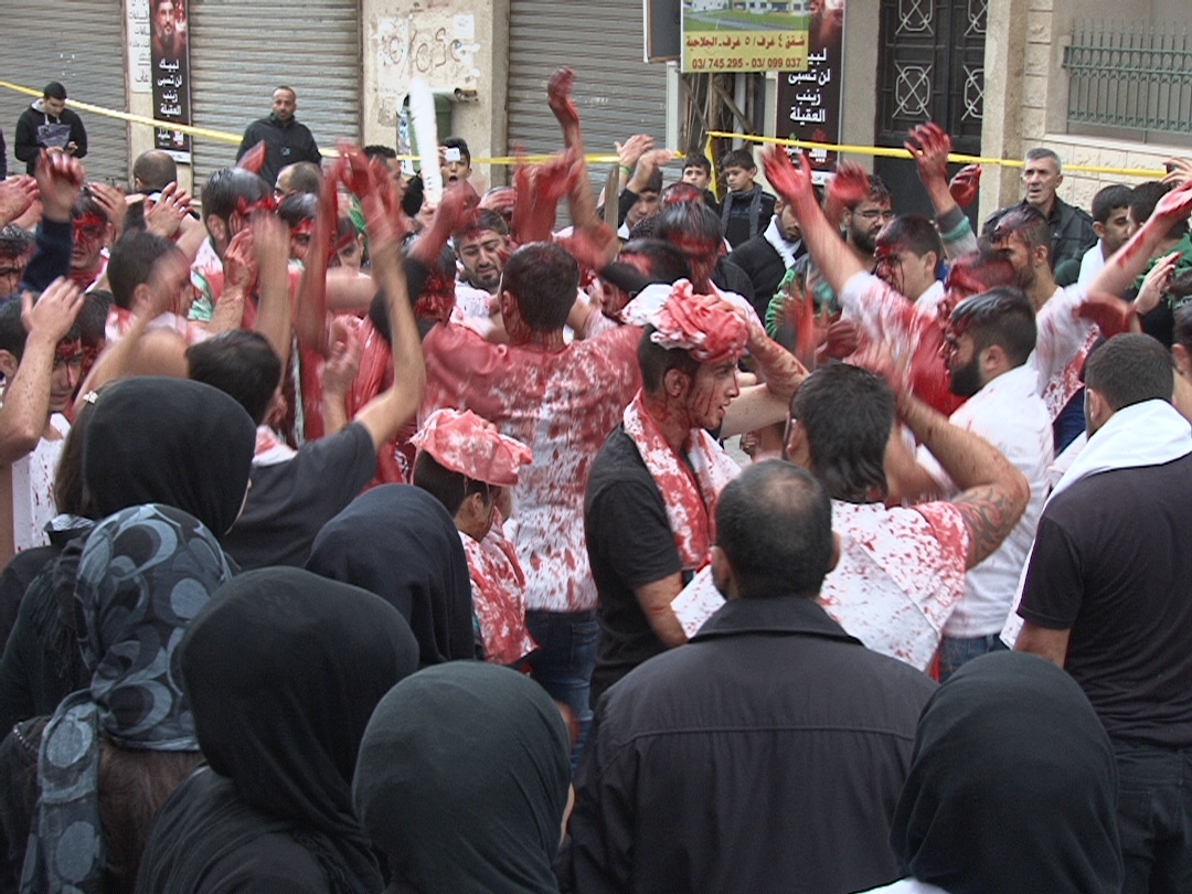 الضريبة وقد سالت الدماء من رؤوسهم تيمنا بمصرع الامام الحسين