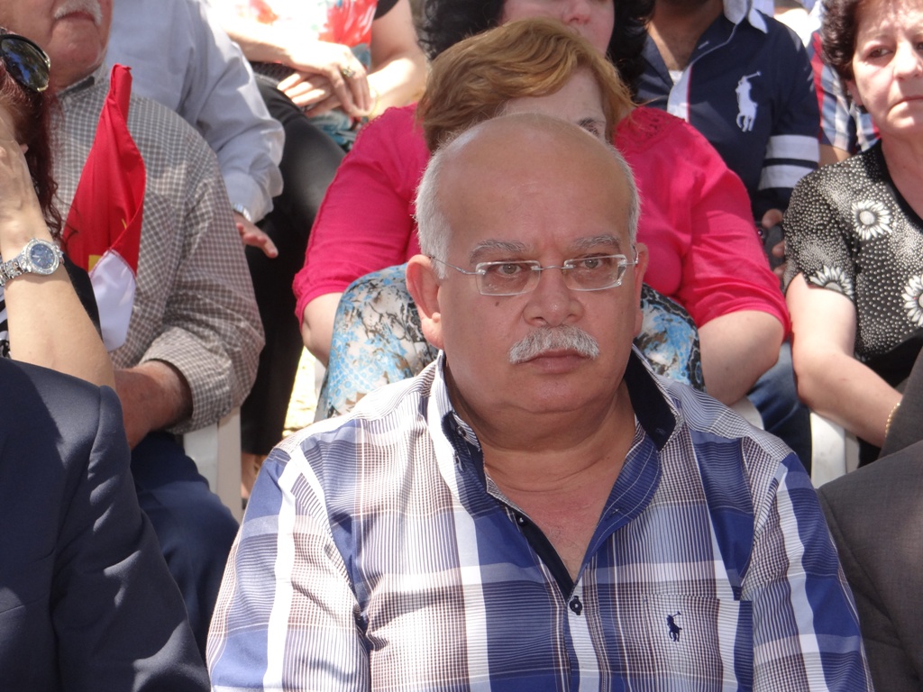 الدكتور خالد حدادة متوسطاً الحضور