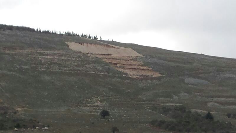 قطعة أرض  في نقطة مرتفعة على تلة الشريقي - شمالي بلدة الخيام، (تبعد خمسون متراً عن خزان الماء بالشريقي)