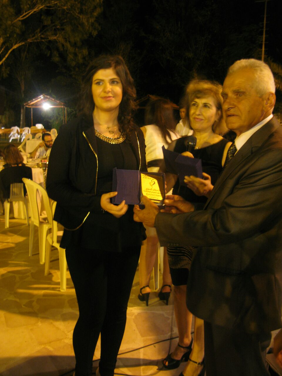 من الحفل السنوي لجمعية سيدات الخيام الذي تخلله تكريم الطلاب المتفوقين - أرشيف