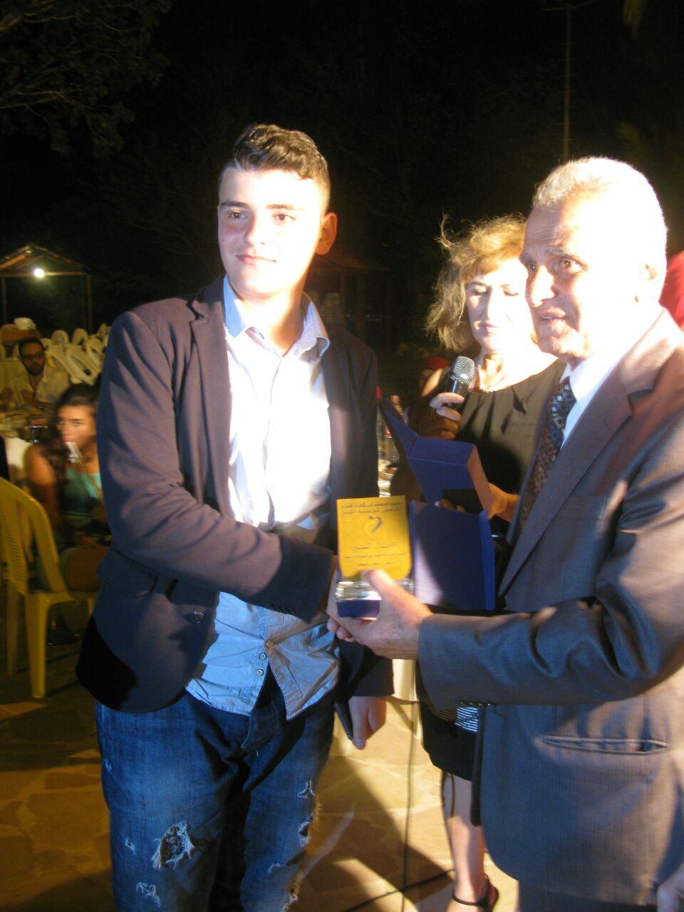 من الحفل السنوي لجمعية سيدات الخيام الذي تخلله تكريم الطلاب المتفوقين - أرشيف