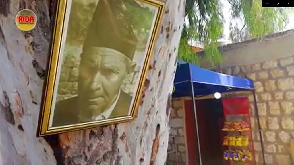 صورة المرحوم أبو علي نعيم على إحدى الكنايات قرب دكانه