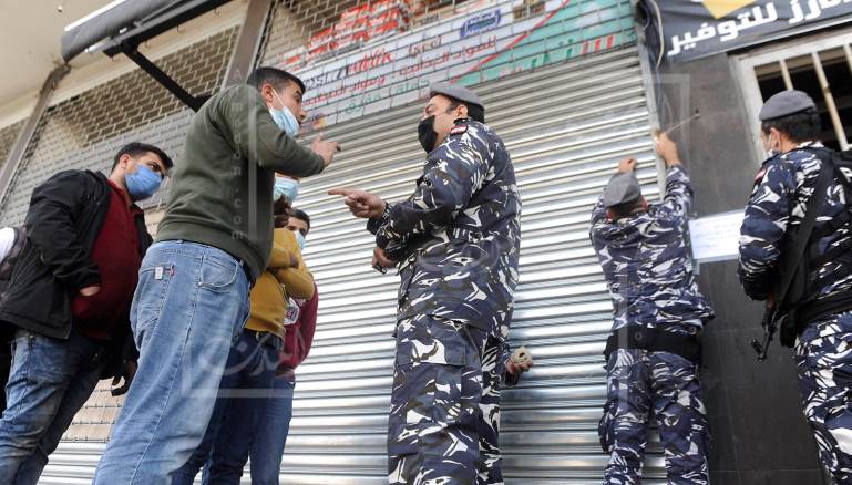 تشبه الاشتباكات المسلحة بالضاحية إلى حد بعيد صراع العصابات (الأرشيف، المدن)