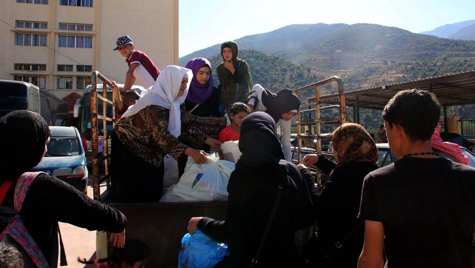 يتخبط لبنان الرسمي أمام أكثر من خطة لعودة السوريين إلى بلادهم (Getty)