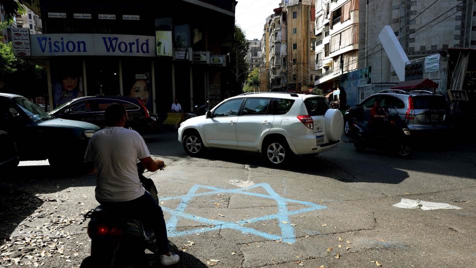 تعيش الضاحية مشاعر فخرٍ ممزوج بالتوجس والخوف (Getty)